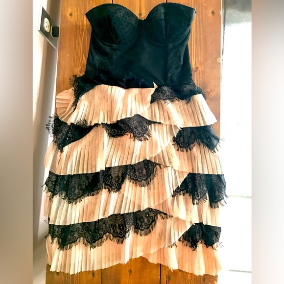 H&M Dresses & Skirts - Unique mini dress - worn twice.